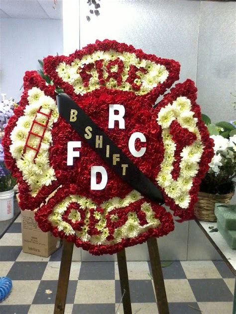 maltese cross funeral flowers.